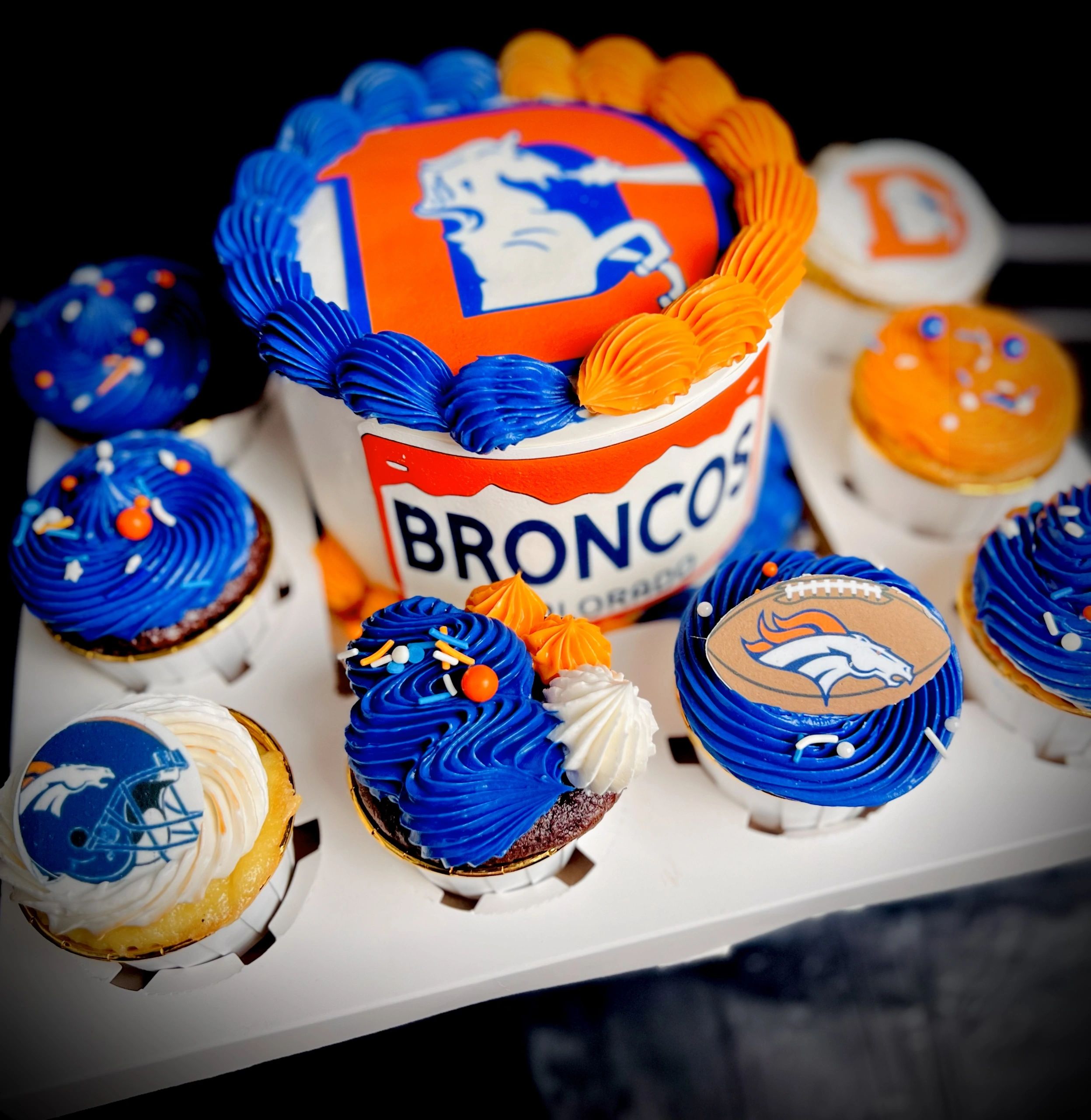 Colorful bento box cakes with various decorations